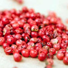 Pink pepper berries used to make essential oil for Black Opium copycat fragrances by Match Perfumes