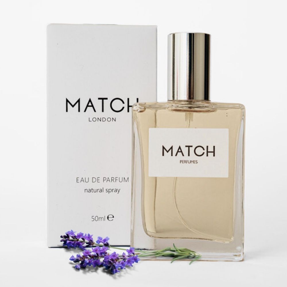 Match Perfume bottle and packaging on a white background with lavender flowers.